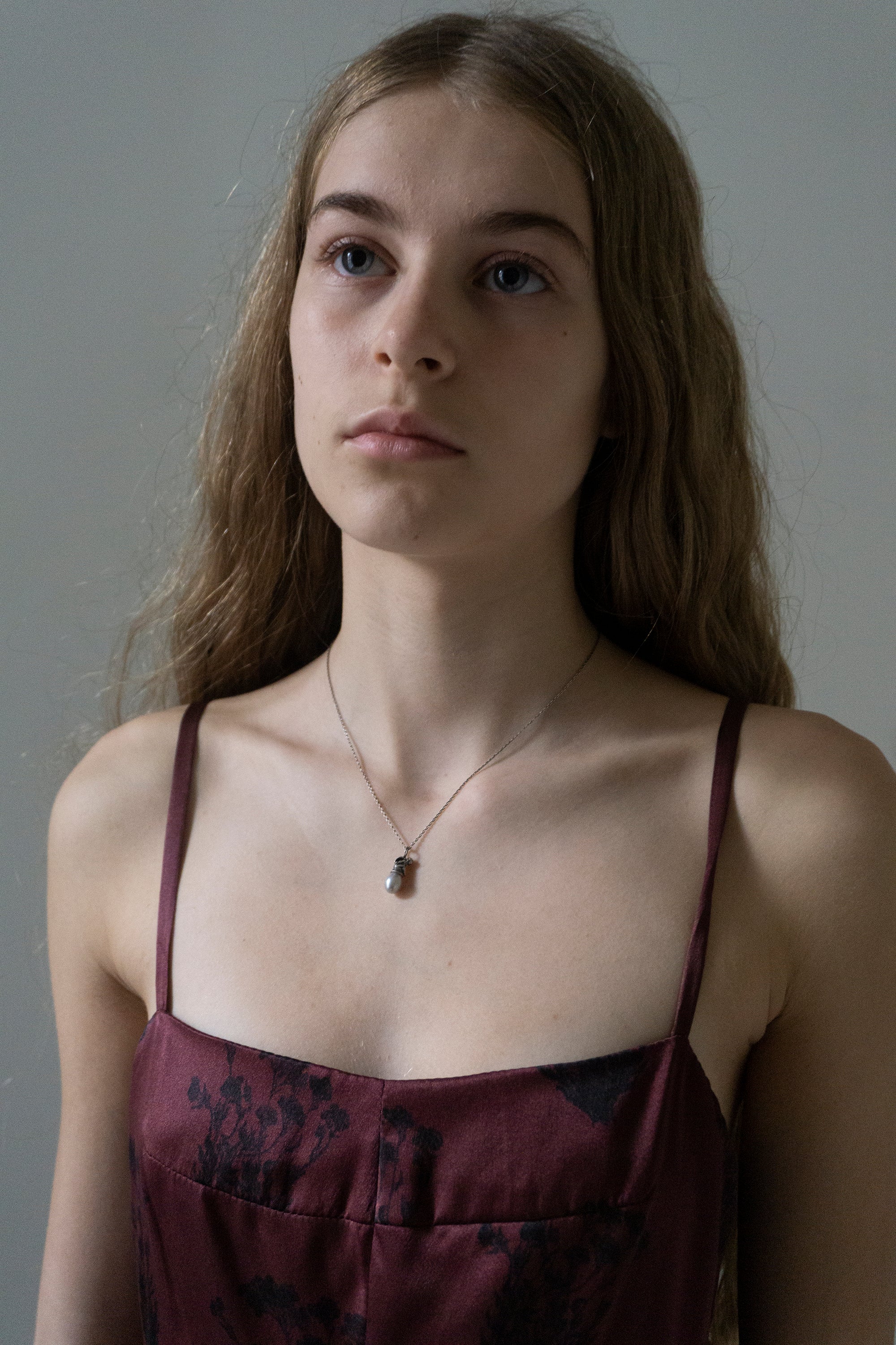 Cherub on a Pearl Necklace